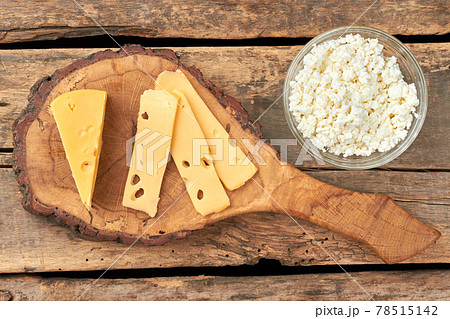 Dairy products on grunge wood. 78515142