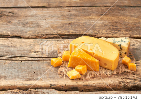 Dairy products on rustic wood. 78515143