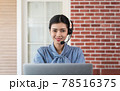 Professional call center agent Talking to customers with headsets while She's working from home are assisting remote customers and consulting client by remortly in call center and remotely concept. 78516375