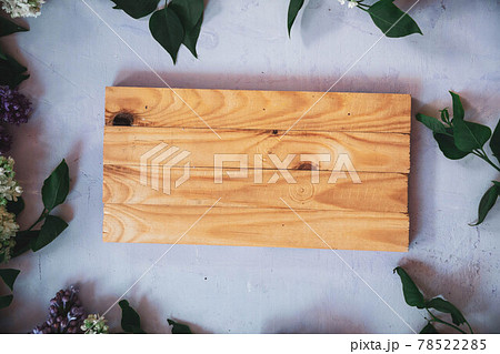The beautiful lilac on a wooden surface The beautiful lilac on a wooden surface 78522285