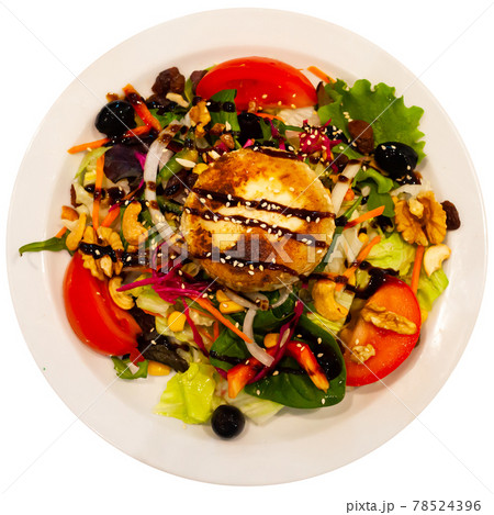 Plate of delicious salad with goat cheese. 78524396