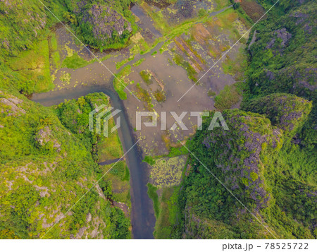 the majestic scenery on Ngo Dong river in Tam Coc Bich Dong view from drone in Ninh Binh province of Viet Nam 78525722