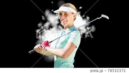 Composition of smiling caucasian female golf player with golf club over clouds on black background Composition of smiling caucasian female golf player with golf club over clouds on black background 78532372