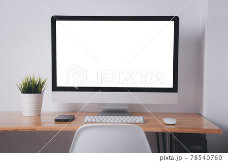Computer monitor with white blank screen on the business desk Computer monitor with white blank screen on the business desk 78540760
