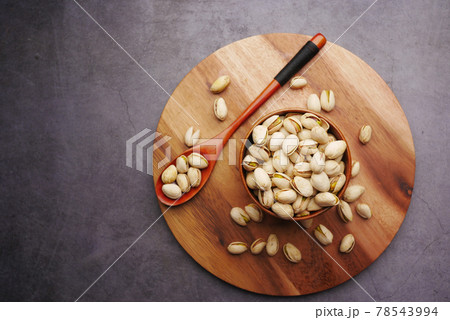 cashew nut in a bowl on black background  78543994