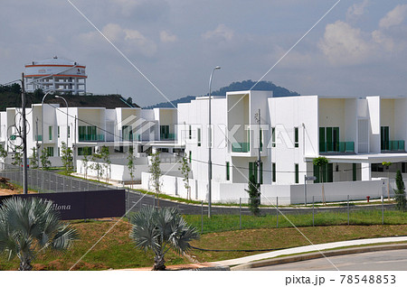 SENDAYAN, MALAYSIA -JANUARY 26, 2017: Facade of two story luxury terrace house  in Sendayan, Malaysia. The house was completed and ready for occupation. 78548853