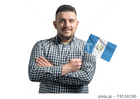 White guy holding a flag of Guatemala smiling confident with crossed arms isolated on a white background 78550290