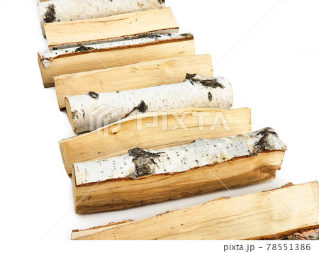 Firewood isolated on white background. Line of wood birch logs, bonfire. Close-up, front view 78551386