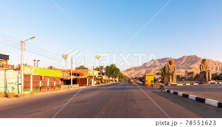 Colossi of Memnon, famous statues on the road to Luxor Necropolis, Egypt Colossi of Memnon, famous statues on the road to Luxor Necropolis, Egypt 78551623
