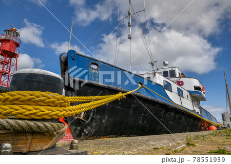 Den Helder, the Netherlands. The boats and warehouses of the former shipyard Willems in Den Helder, the Netherlands Den Helder, the Netherlands. The boats and warehouses of the former shipyard Willems in Den Helder, the Netherlands 78551939