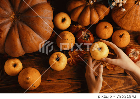 A bunch of pumpkins and apples. A bunch of pumpkins and apples. 78551942