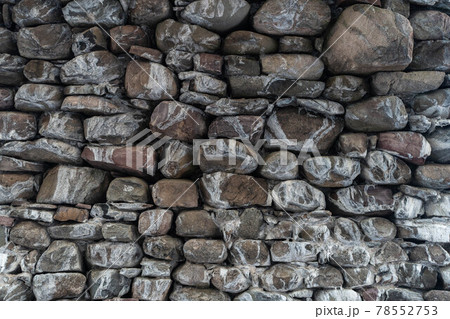 Texture of a stone wall. Old castle stone wall texture background. Stone wall as a background or texture. Part of a stone wall, for background or texture. Texture of a stone wall. Old castle stone wall texture background. Stone wall as a background or texture. Part of a stone wall, for background or texture. 78552753