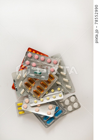 Stack of pills on a white background Stack of pills on a white background 78552990