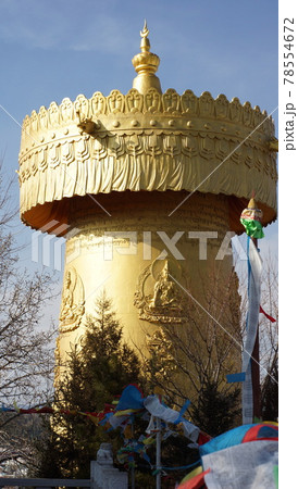 golden prayer wheel outlook in shangri la old town golden prayer wheel outlook in shangri la old town 78554672