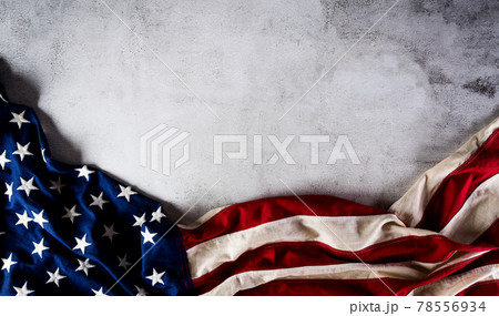 Happy Independence day: 4th of July, American flag on dark stone background with the text. 78556934