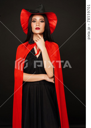 Asian beautiful woman in witches hat and costume in halloween festival. 78559701