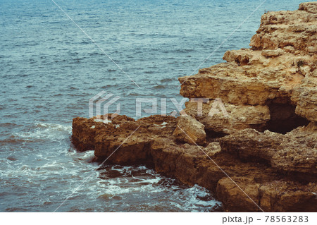 rocks ledges by the sea 78563283