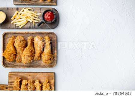Crispy fried chicken on white background, flat lay, with copy space 78564935