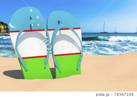 Flip flops with Uzbek flag on the beach. Uzbekistan resorts, vacation, tours, travel packages concept. 3D rendering 78567108
