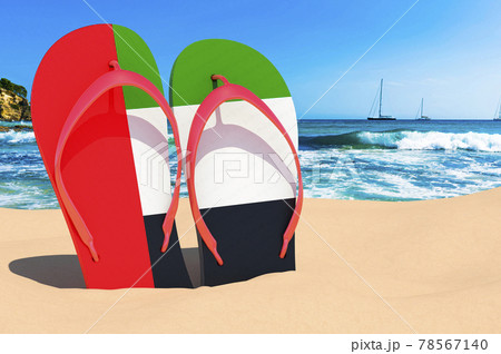 Flip flops with The United Arab Emirates flag on the beach. the UAE resorts, vacation, tours, travel packages concept. 3D rendering 78567140