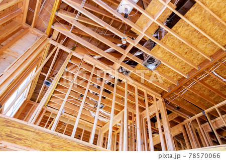 Frame house roof of house attic under construction frame wooden beams 78570066