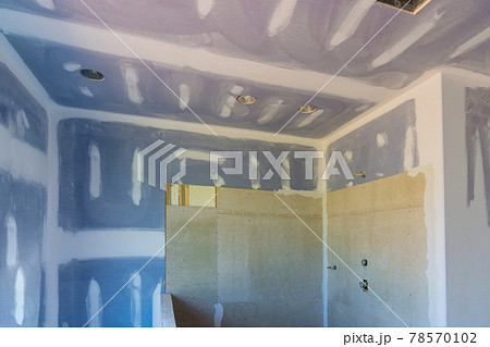 Renovation construction of master bathroom with new under construction bathroom interior drywall 78570102