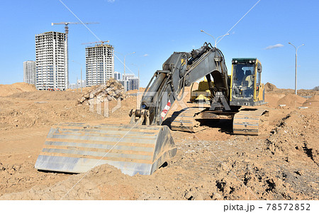 Excavator with grading bucket. Heavy machinery and construction equipment 78572852