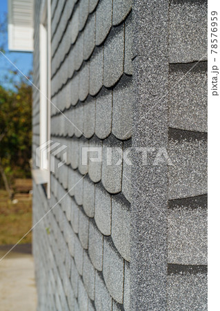 Shingles texture - close up view of asphalt roofing shingles Shingles texture - close up view of asphalt roofing shingles 78576959