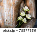Buddha statue and lotus flowers 78577356