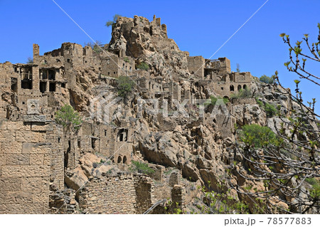 Abandoned village Gamsutl at the top of the mountain peak in Dagestan, Russia 78577883