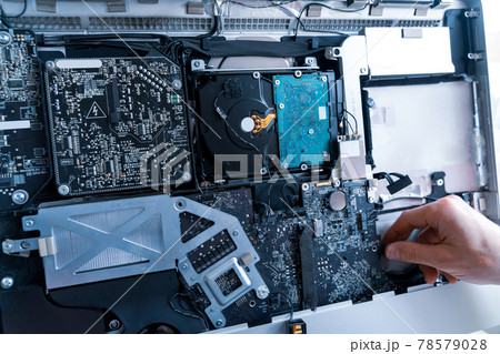 Technology maintenance hardware from man engineer. Repair computers. Electronic technician pc service. 78579028