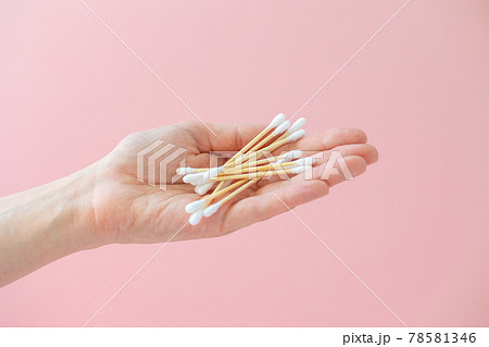 environmentally friendly bamboo and cotton cotton buds on a pink background, bamboo toothbrushes for adults and children. human personal hygiene products without harming the environment environmentally friendly bamboo and cotton cotton buds on a pink background, bamboo toothbrushes for adults and children. human personal hygiene products without harming the environment 78581346