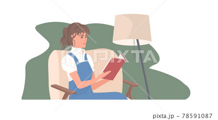 beautiful girl reading book while sitting on chair coronavirus pandemic quarantine stay home concept 78591087