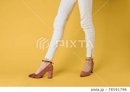 Female feet fashion shoes luxury yellow background 78591796