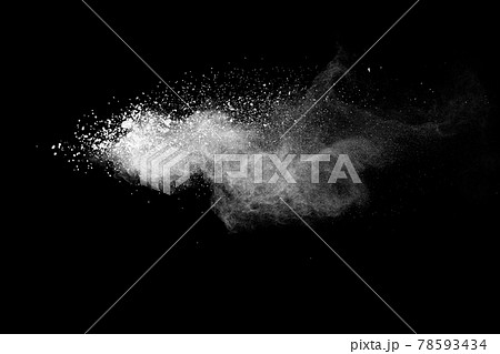 White powder explosion isolated on black background.White dust particles splash. White powder explosion isolated on black background.White dust particles splash. 78593434