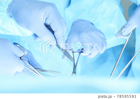 A group of surgeons is operating at the hospital, close-up of hands. Health care concept 78595591