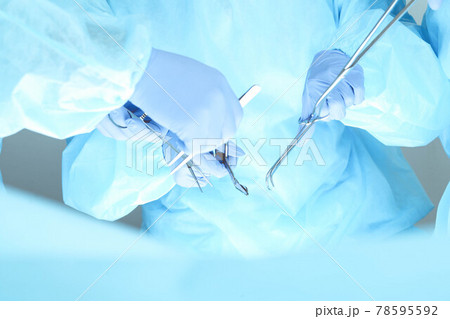 A group of surgeons is operating at the hospital, close-up of hands. Health care concept A group of surgeons is operating at the hospital, close-up of hands. Health care concept 78595592