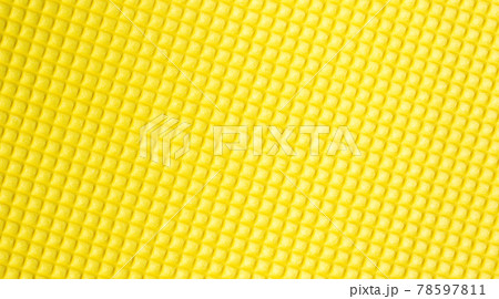 Close up of yellow foam for a background. Close up of yellow foam for a background. 78597811