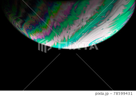 Colourful bubbles. Abstract galaxy background with globe planet earth in universe space with sunlight on dark background. Abstract colorful soap bubble. 78599431