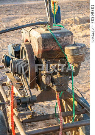 Close-up view of a engine for a pump for pumping water in Sudan Close-up view of a engine for a pump for pumping water in Sudan 78599881