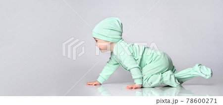 Little baby toddler wearing body set of slider and 78600271