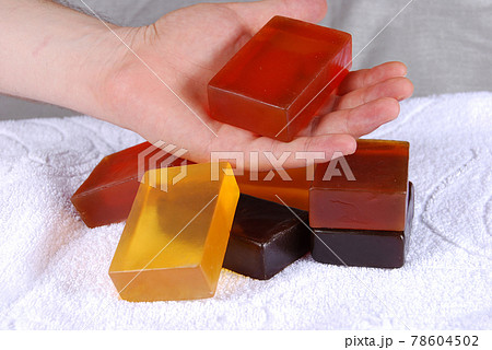 Orange yellow aromatic, fragrant soap bars and hand 78604502