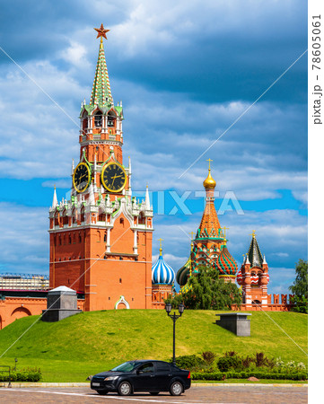 Moscow Kremlin in summer, Russia. Vertical scenic view of Spasskaya Tower and St Basil's Cathedral Moscow Kremlin in summer, Russia. Vertical scenic view of Spasskaya Tower and St Basil's Cathedral 78605061