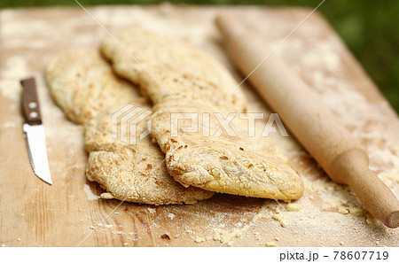 two ciabatta bread loaf fresh bake close up photo on kitchen board two ciabatta bread loaf fresh bake close up photo on kitchen board 78607719