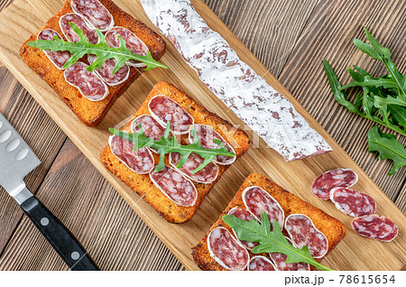 Toasts with fuet 78615654