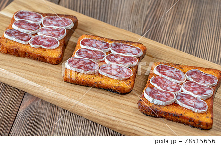 Toasts with fuet 78615656