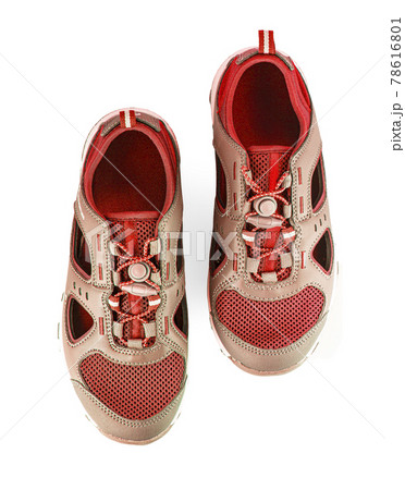 Pair of red sneakers isolated on white background Pair of red sneakers isolated on white background 78616801