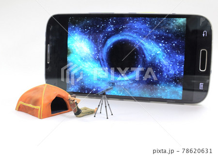 a mini figure of Astronomer with a telescope watching the stars a mini figure of Astronomer with a telescope watching the stars 78620631