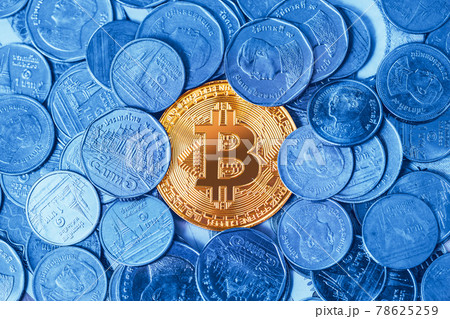 Bitcoin crypto digital currency around with physical coin money Thai Bath. 78625259