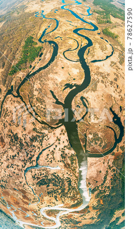 Aerial View River Landscape In Sunny Spring Day. Top View Of Beautiful European Nature From High Attitude. Drone View. Bird's Eye View. Little Small Planet Concept. Panorama Aerial View River Landscape In Sunny Spring Day. Top View Of Beautiful European Nature From High Attitude. Drone View. Bird's Eye View. Little Small Planet Concept. Panorama 78627590